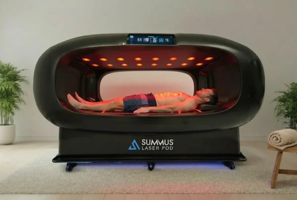 Patient experiencing whole-body laser therapy inside the Class IV Laser Pod at IVRS Wellness Center Amarillo