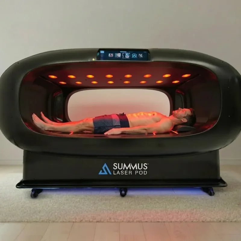 Patient experiencing whole-body laser therapy inside the Class IV Laser Pod at IVRS Wellness Center Amarillo